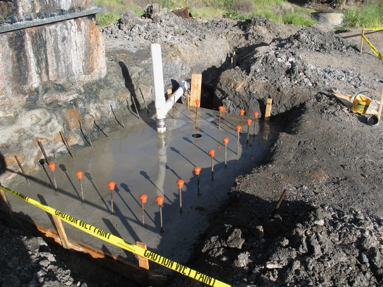 Slab over spring source and cap