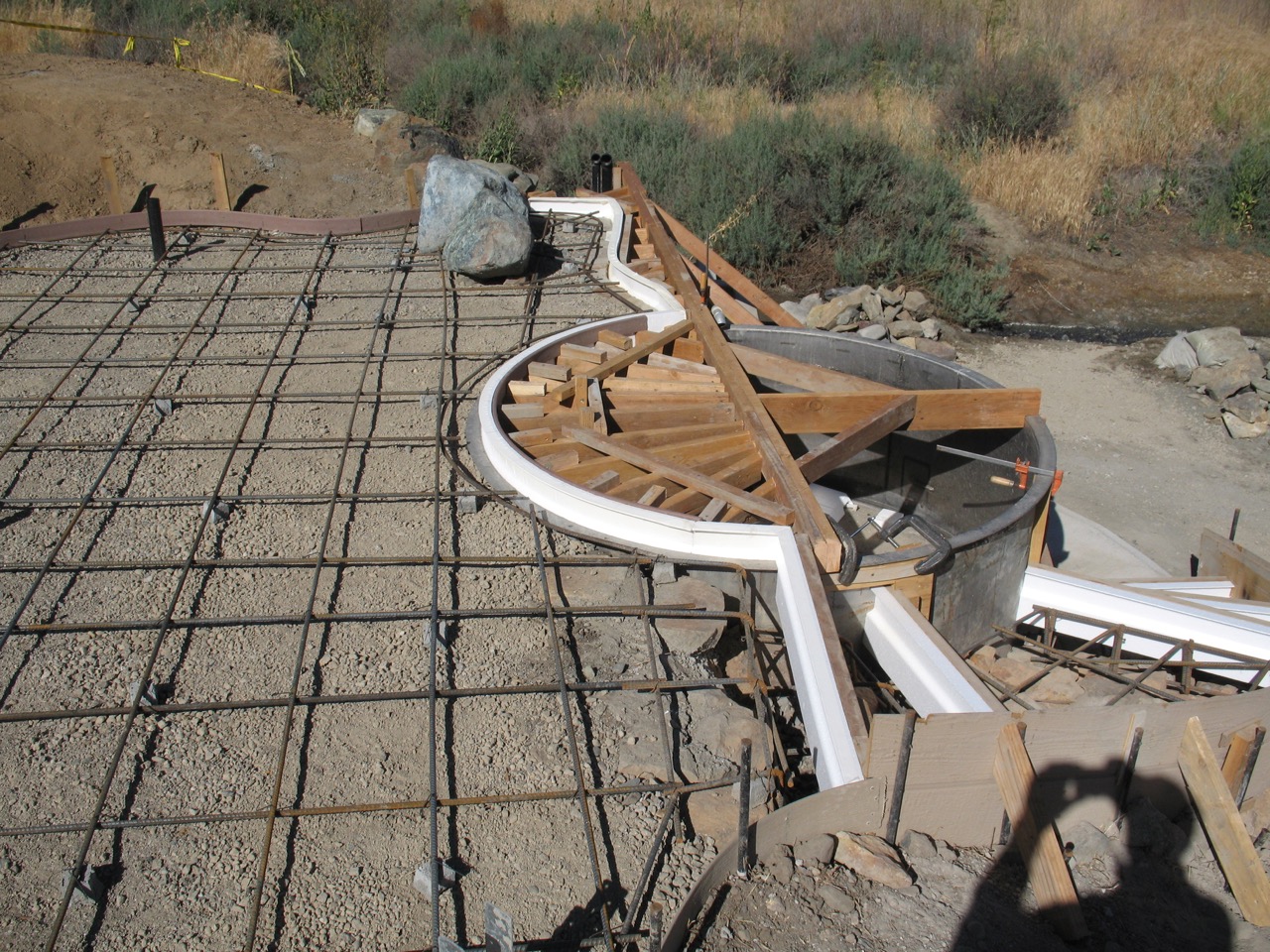Tub patio and cantilevered edge forms