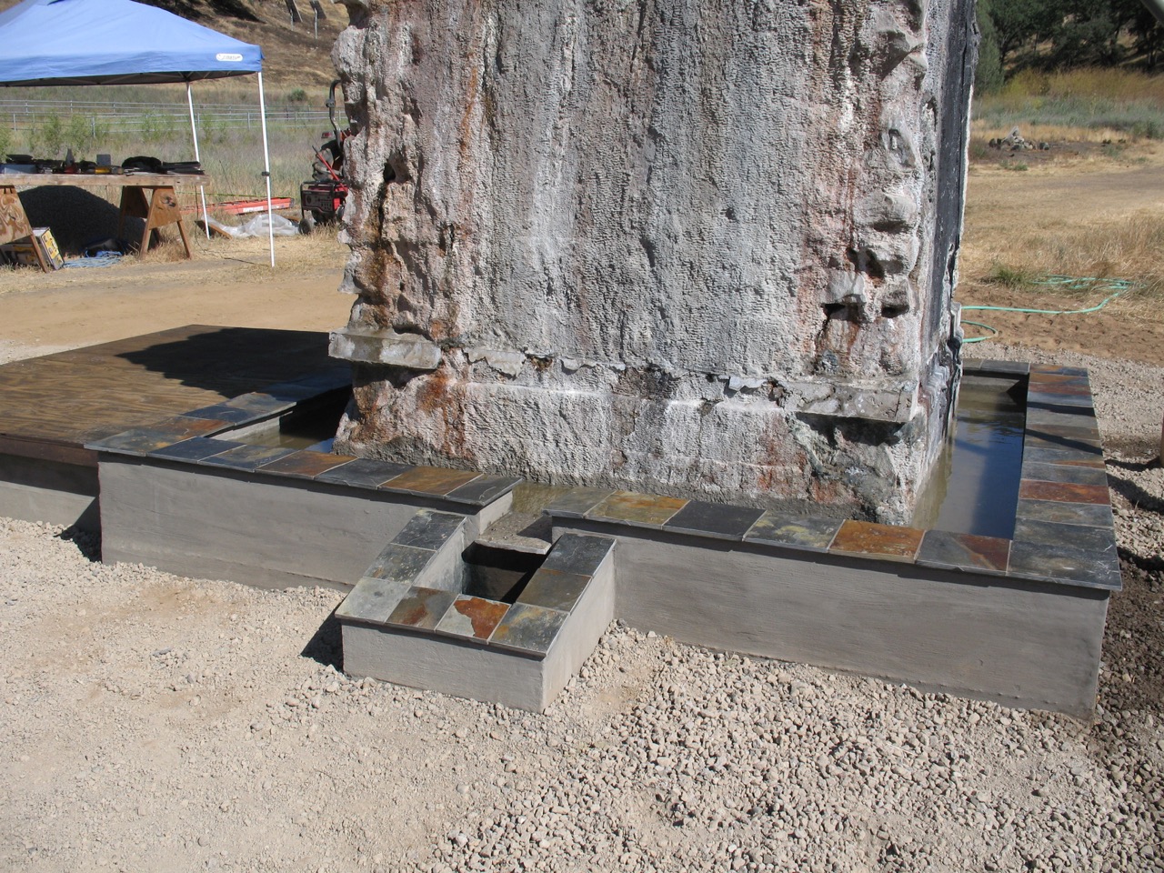 Completed slate cap and mote drain