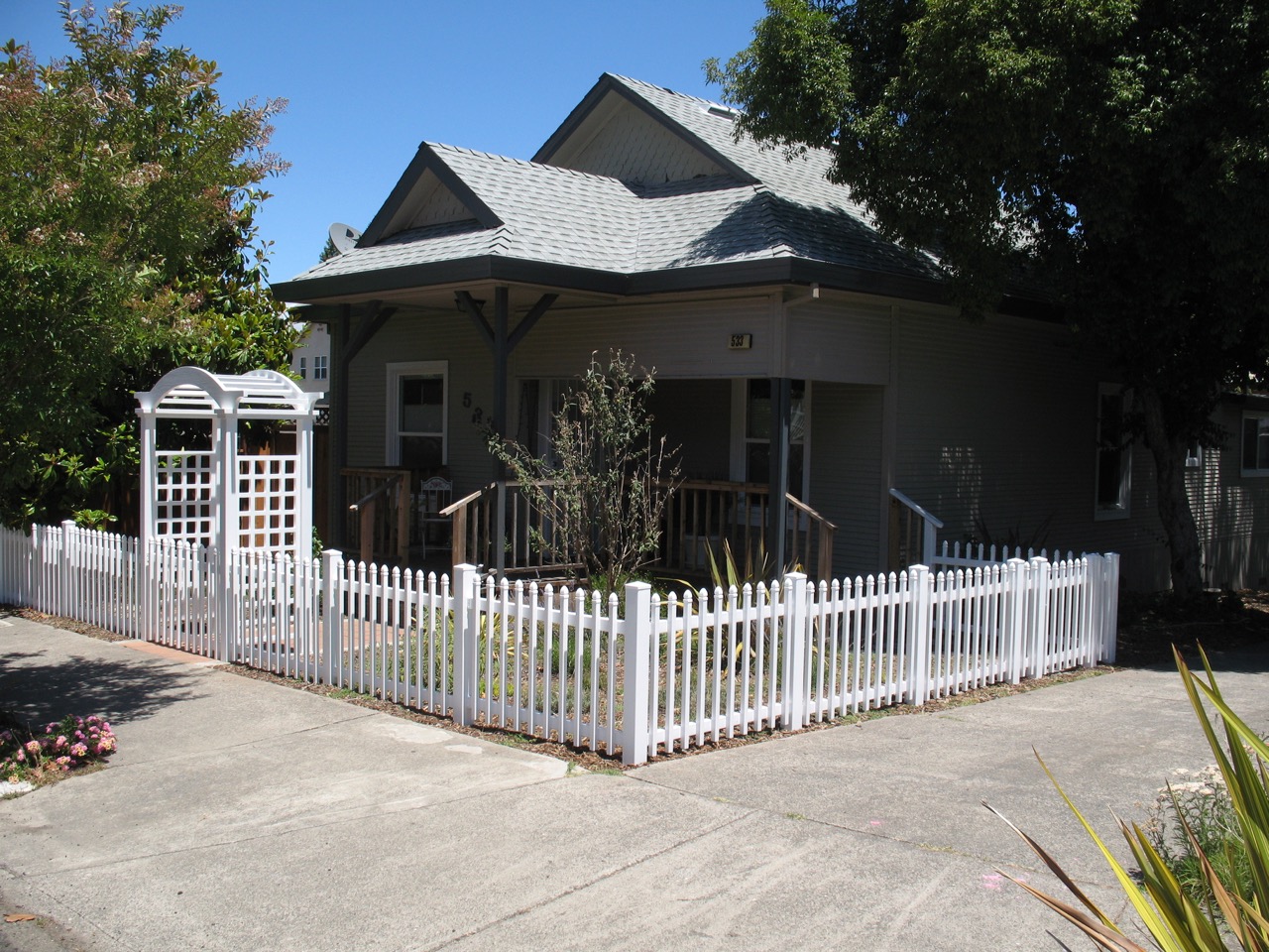 White picket fence and custom built arbor 1