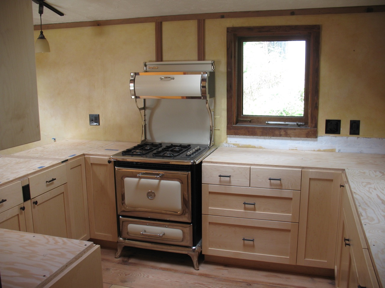 Kitchen cabinetry, faux paint, trim