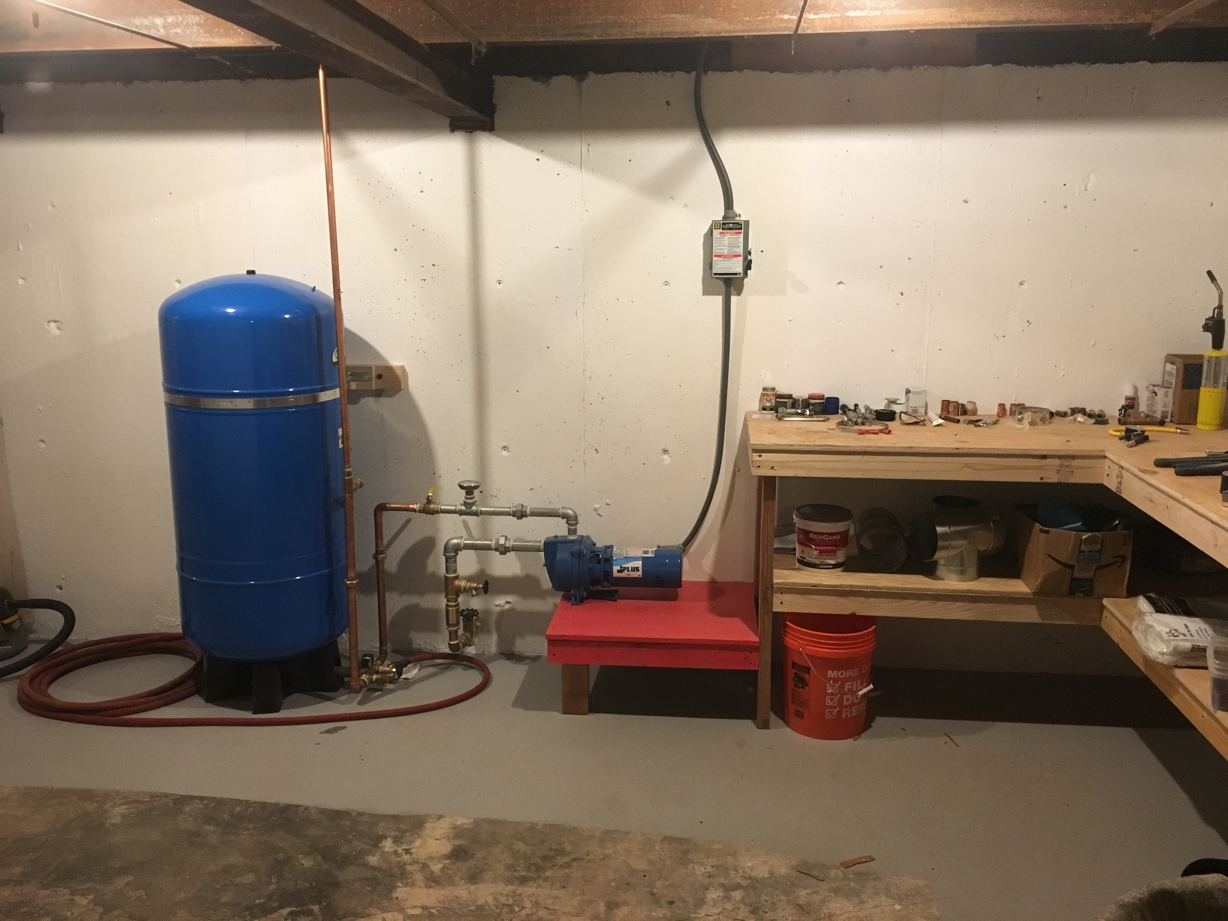 New pressure pump and tank, plumbing, bench